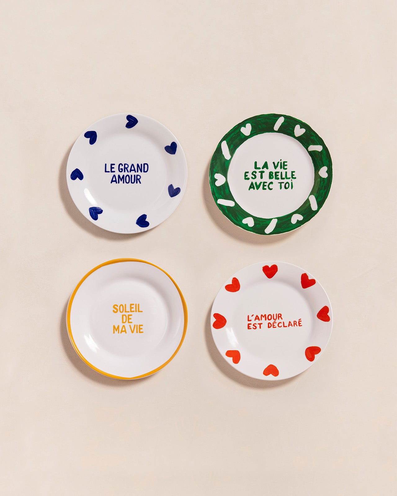 Le lot de 4 assiettes à messages en porcelaine - 19 cm