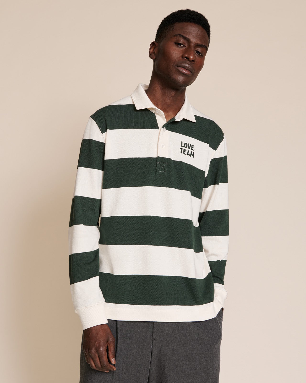 Le polo Love Team unisexe en coton bio - vert
