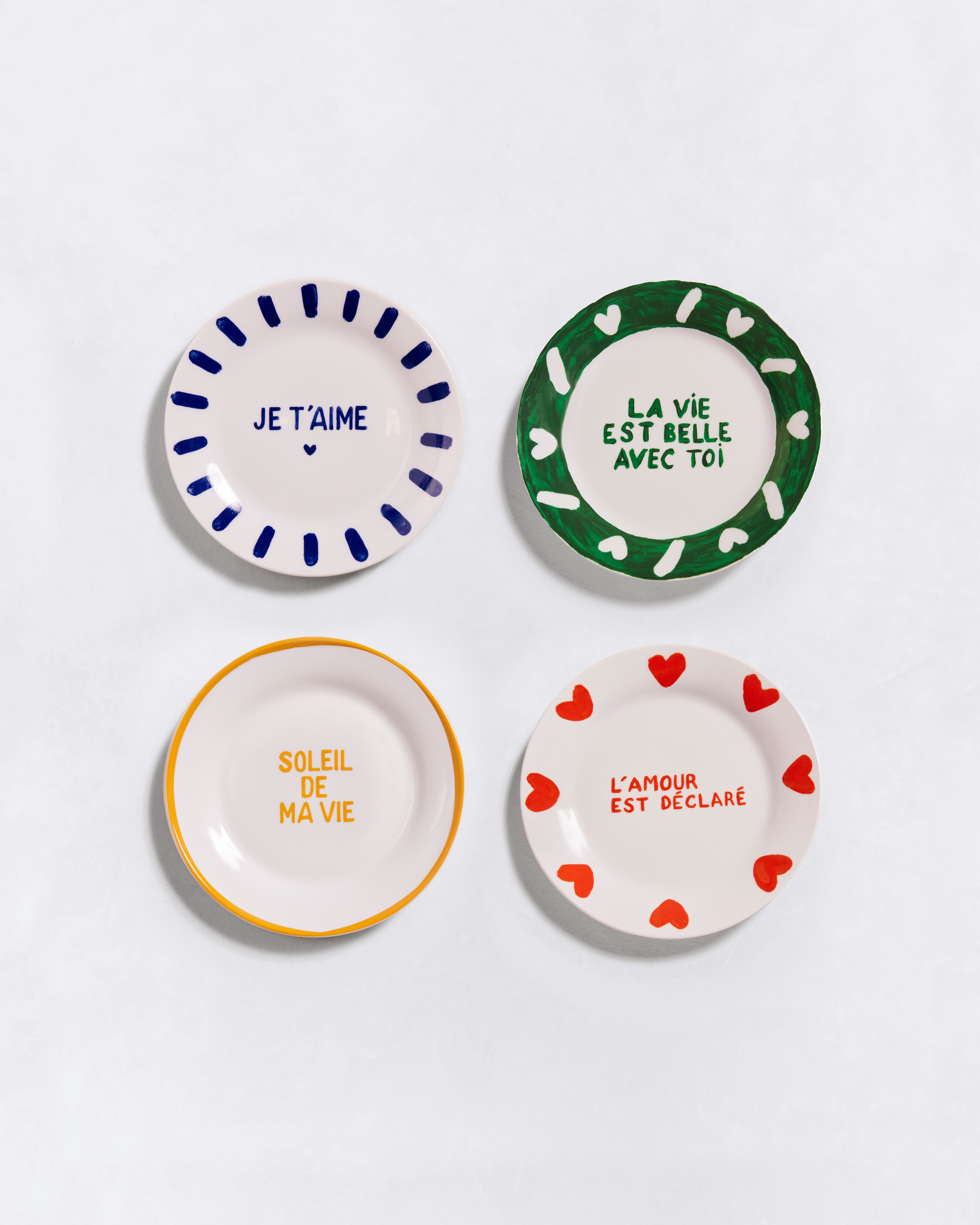 Le lot de 4 assiettes à message en porcelaine - 19 cm