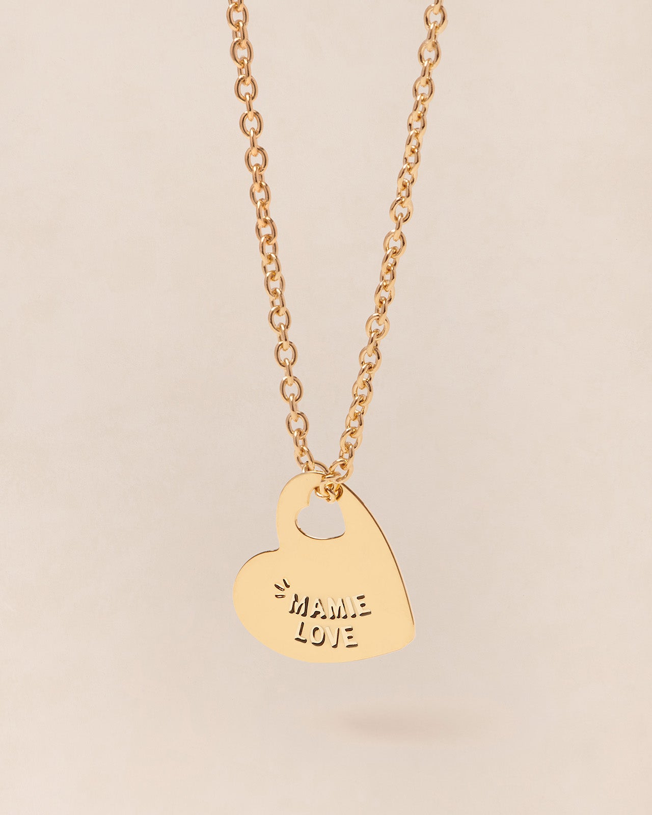 La médaille Mona Mamie love cœur - dorée à l