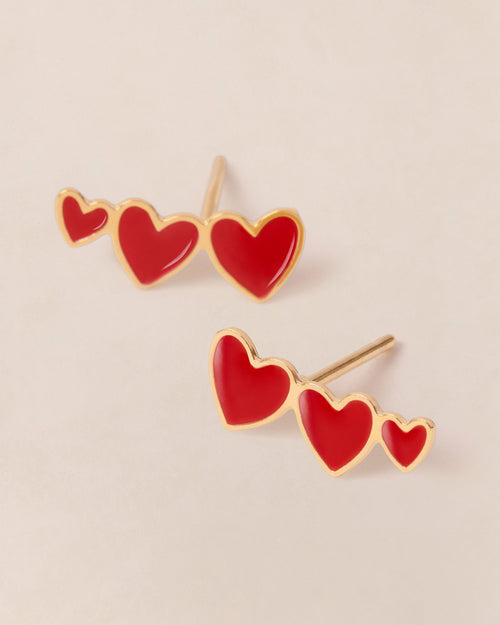 Les boucles d'oreilles Clarisse 3 cœurs rouges - dorées à l'or fin 24 carats - émoi émoi   - 1 