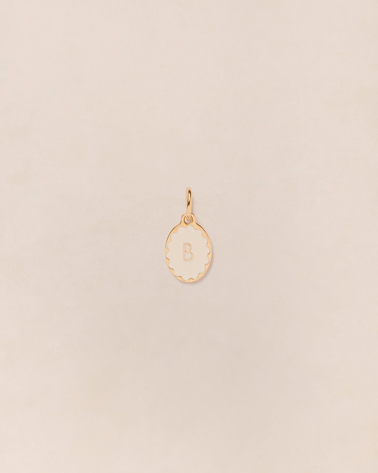 La médaille Initiale ovale - ivoire - 10mm