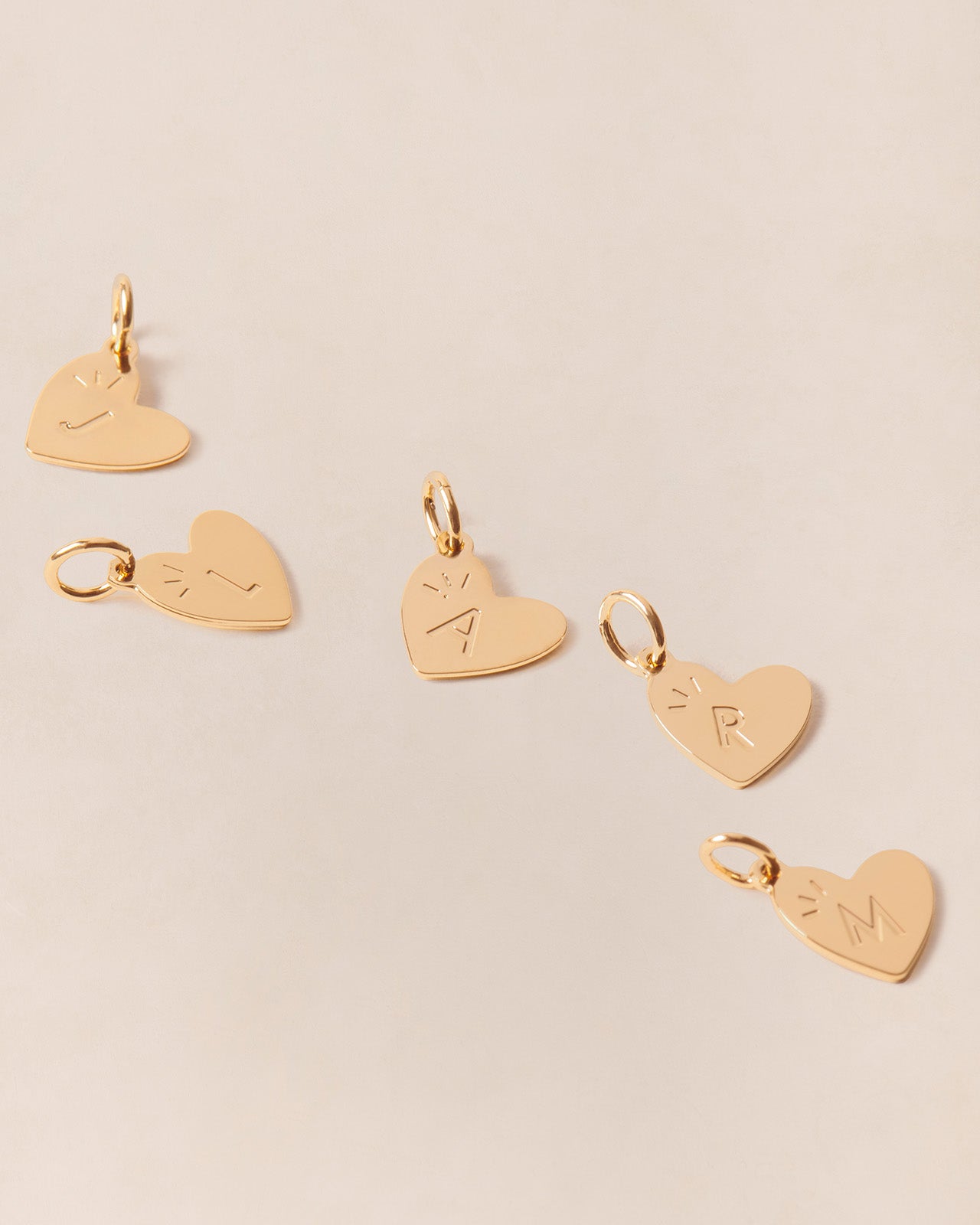 La médaille Initiale cœur - dorée à l
