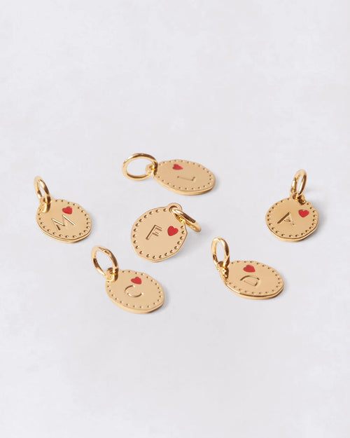 La médaille Initiale Manoa - rouge et dorée à l'or fin 24 carats - 10mm - émoi émoi   - 1 